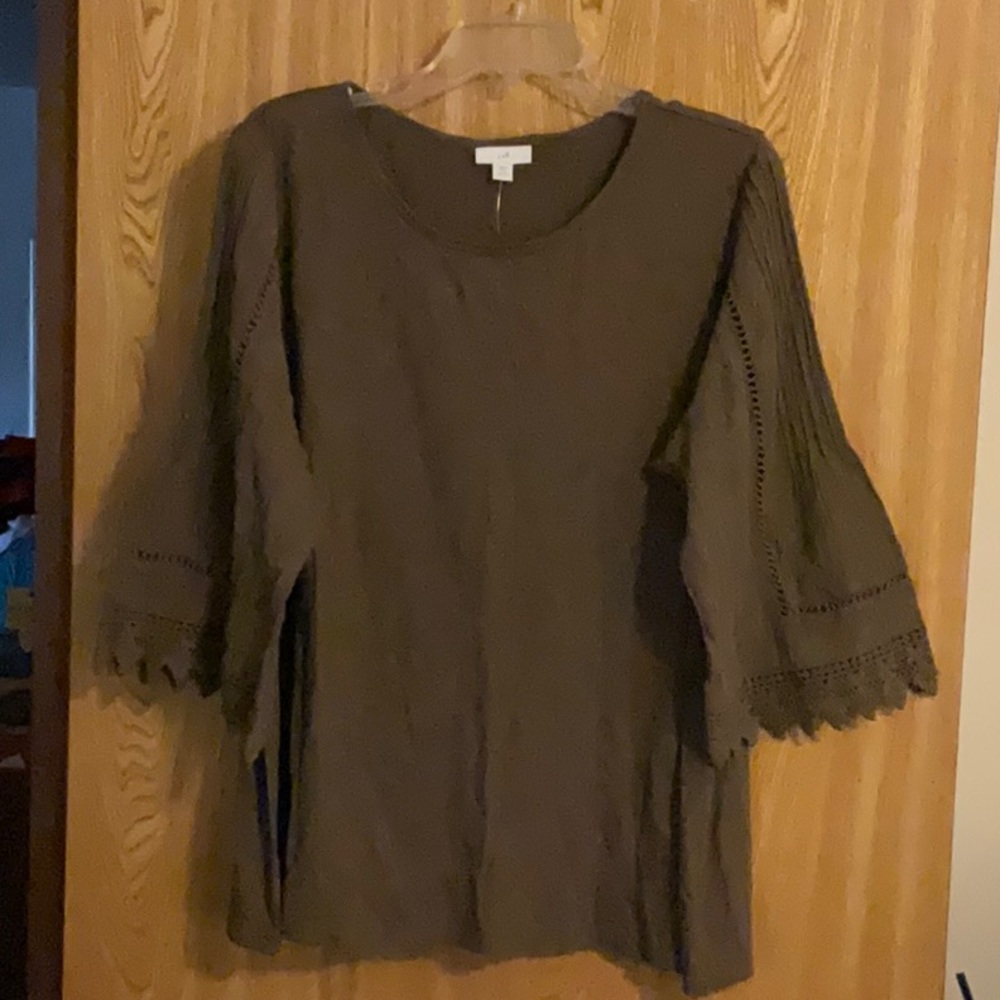 Ladies brown blouse with crochet lace trim.  New with tags.
